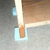 We use blocks to protect wooden furniture from coming into contact with wet surfaces.